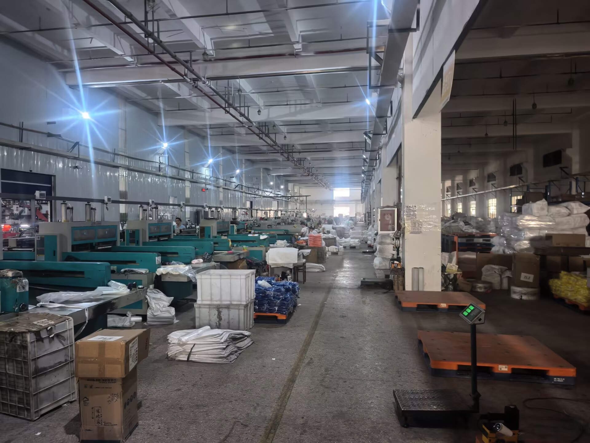 Wide view of the Yiwu factory production floor